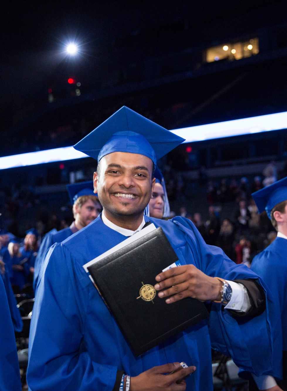 Graduate at commencement ceremony